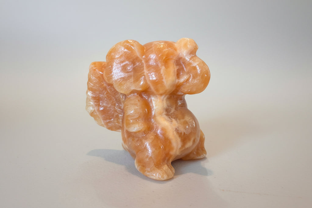 Orange Calcite Winged Elephant