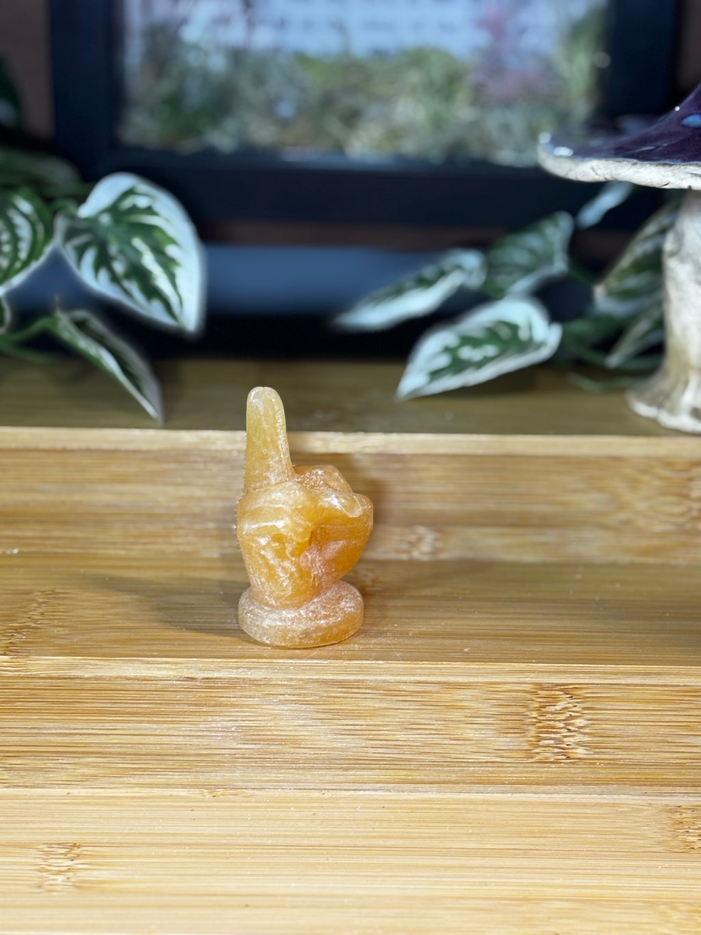 Orange Calcite Middle Finger Carving