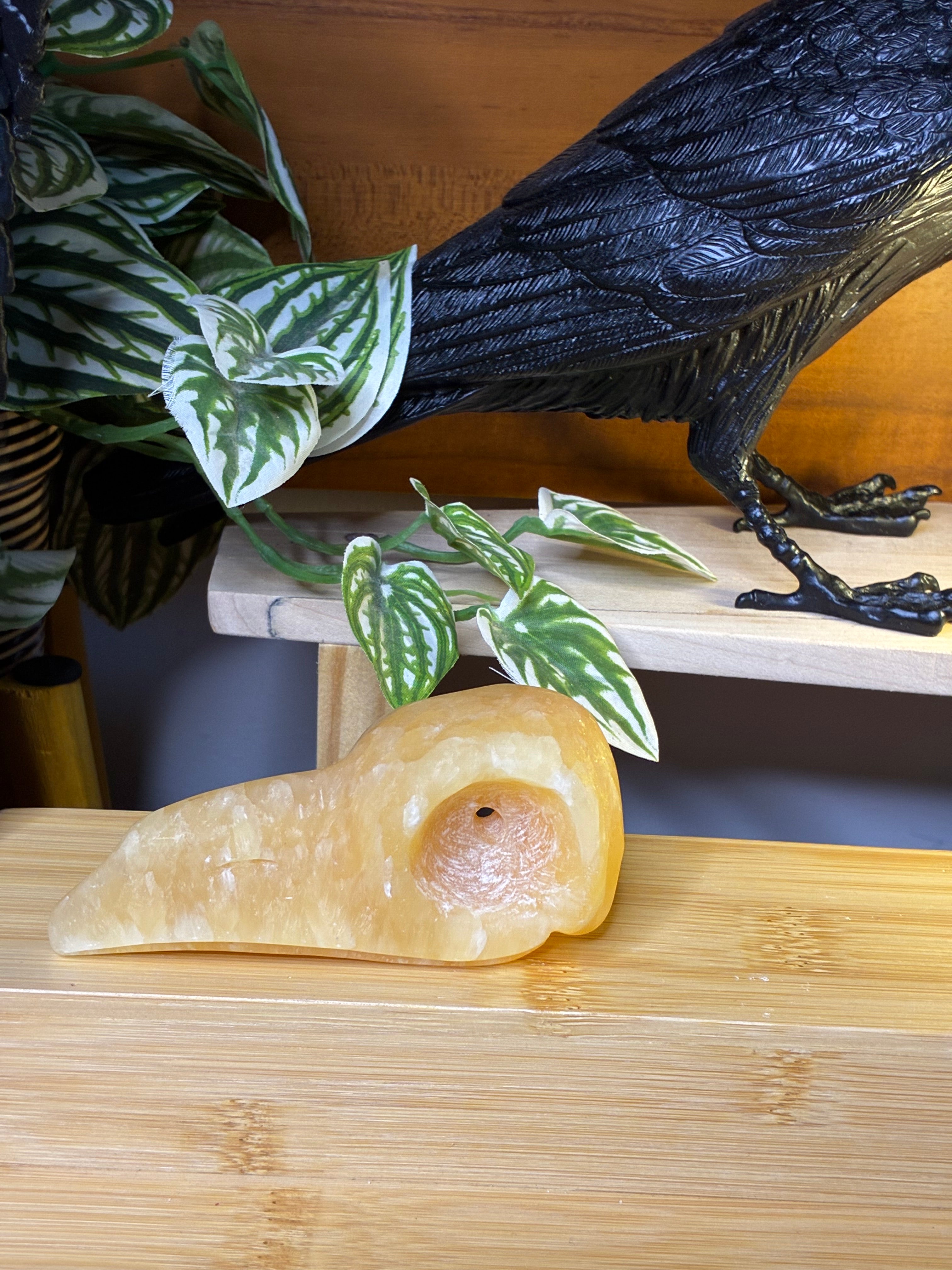 Orange Calcite Raven Skull