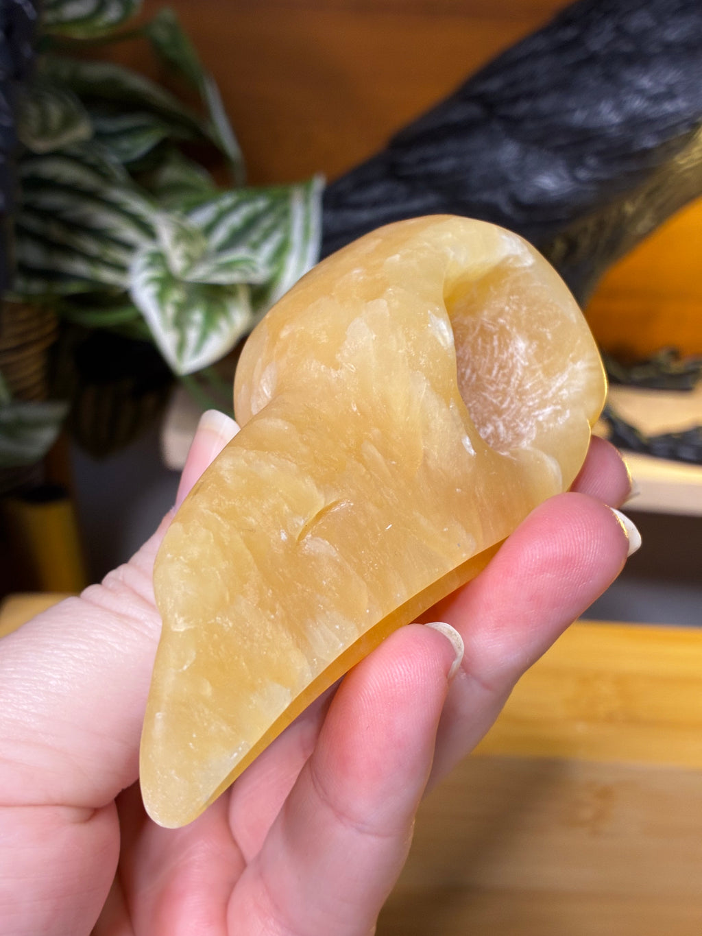 Orange Calcite Raven Skull