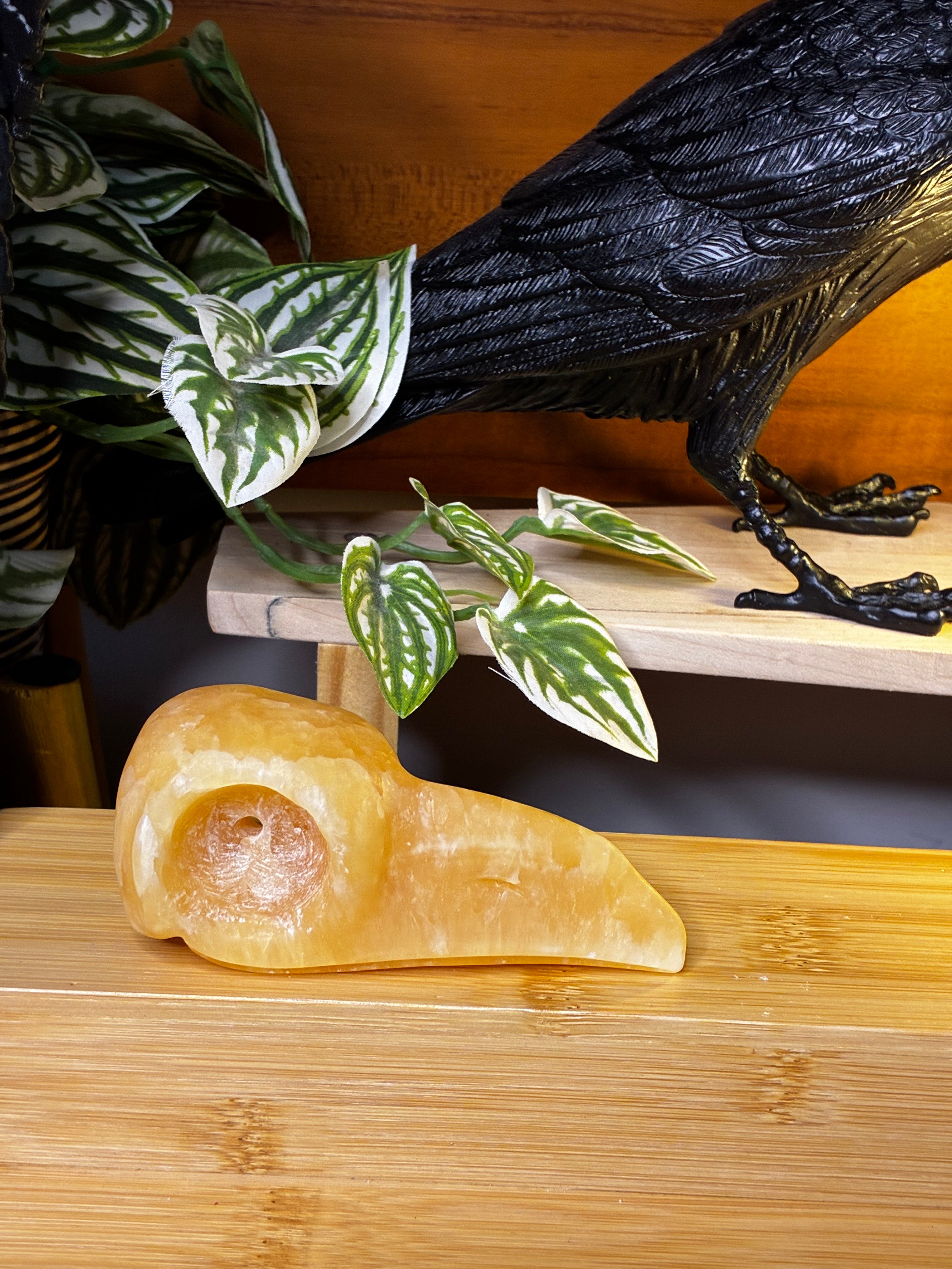 Orange Calcite Raven Skull