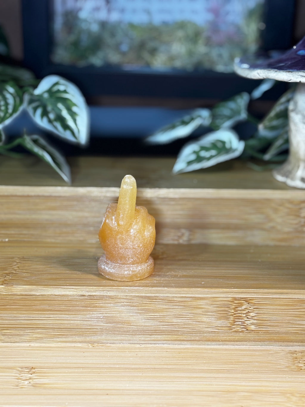 Orange Calcite Middle Finger Carving