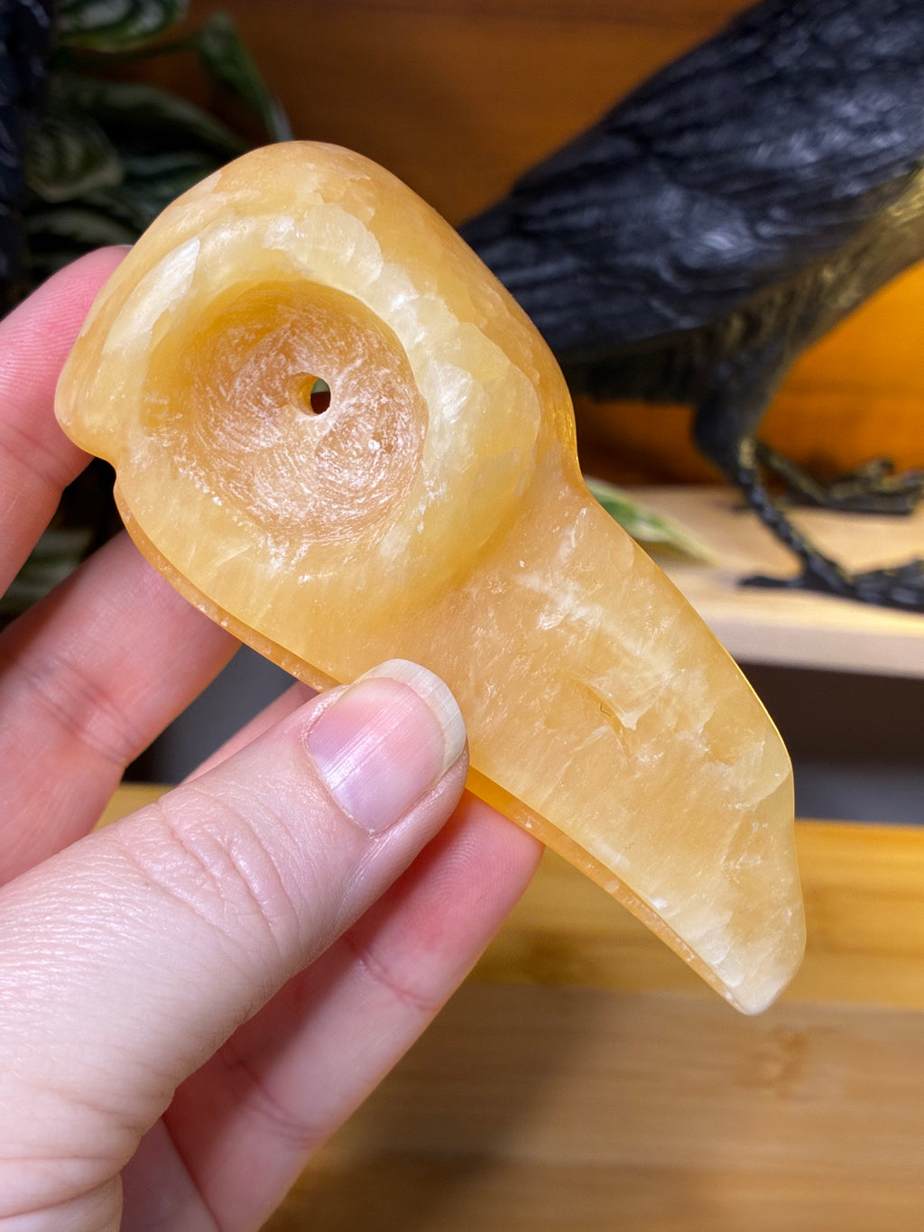 Orange Calcite Raven Skull