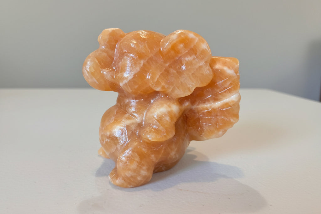 Orange Calcite Winged Elephant